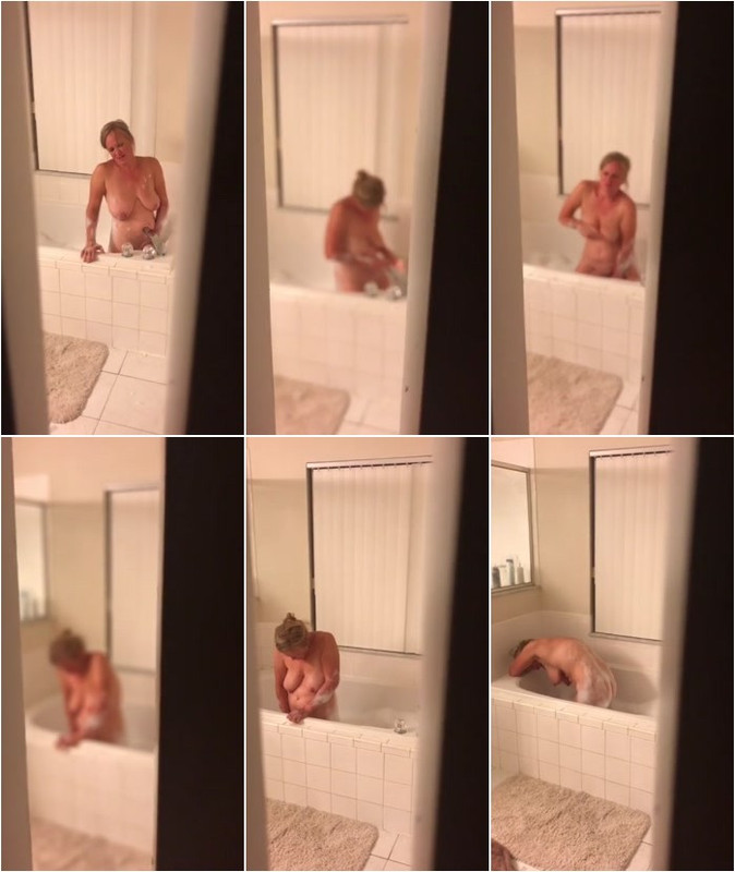 spying-horny-busty-blonde-wife-masturbating-with-dildo-in-the-bathtub-2.jpg