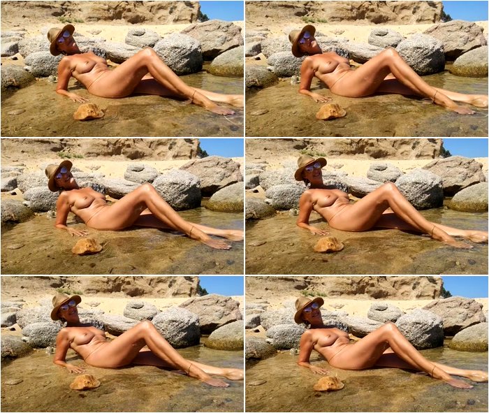 Nude-Sunbathing-in-Costa-Brava-Spain-July-2017-ph597a50532a54b-mp4-3.jpg